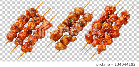 Grilled Korean Dakkochi chicken skewers coated in glossy sesame glaze,isolated on white background, Asian cuisine Grilled Korean Dakkochi chicken skewers coated in glossy sesame glaze,isolated on white background, Asian cuisine 134044182
