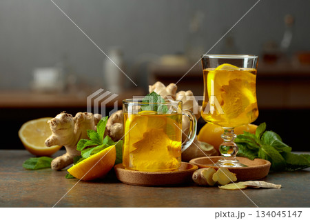 Ginger tea with lemon and mint. 134045147