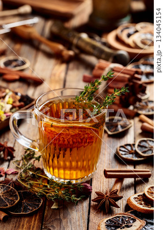 Herbal tea with thyme and dried citrus. 134045154