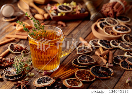Herbal tea with thyme and dried citrus. Herbal tea with thyme and dried citrus. 134045155