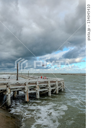 Nieuwpoort, West-Vlaanderen, Belgium, Ocotber 25th, 2025, Rugged maritime waterfront viewing 134045410