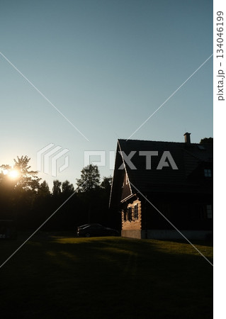 Golden Sunlight Bathes Rural Farmhouse Gable 134046199