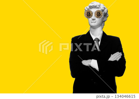 Abstract modern collage. The man with the plaster head of David Smiling businessman standing with arms folded with bitcoin eyes isolated on yellow background Abstract modern collage. The man with the plaster head of David Smiling businessman standing with arms folded with bitcoin eyes isolated on yellow background 134046615