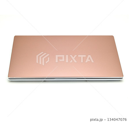A laptop with a pink cover A laptop with a pink cover 134047076