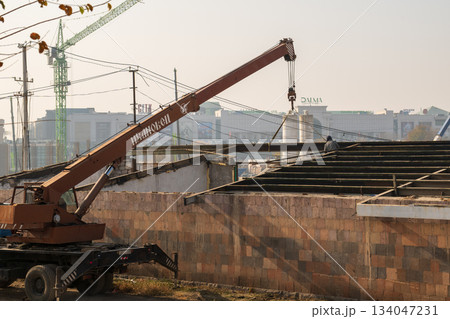 Yerevan Armenia 10.25.2025. A crane is lifting a large object 134047231