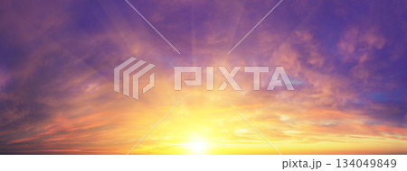 Panorama of blazing dramatic evening sky during sunset with gradient color 134049849
