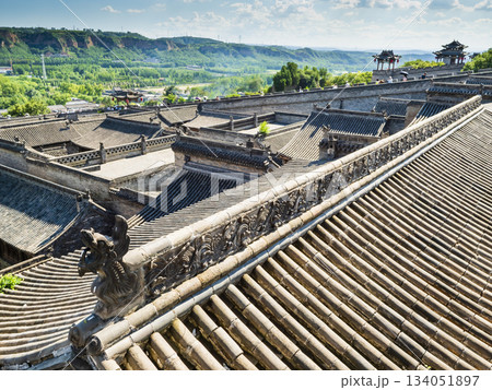 Chinese tiled roofs at the historic Wang Family Courtyard near Pingyao, Shanxi Province, China Chinese tiled roofs at the historic Wang Family Courtyard near Pingyao, Shanxi Province, China 134051897