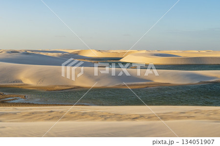 Crystal clear blue lagoons and sand dunes in Lencois Maranhenses National Park, Maranhao, Brazil Crystal clear blue lagoons and sand dunes in Lencois Maranhenses National Park, Maranhao, Brazil 134051907