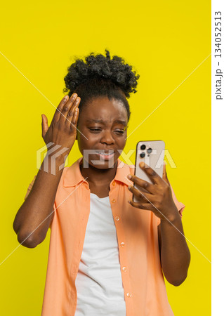 Upset sad woman use smartphone play game loses loss fail unlucky news bad lottery results crisis 134052513