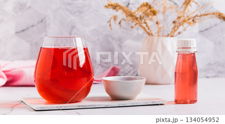 A drink for rapid hydratation and replenishment of fluids and salts in a glass web banner A drink for rapid hydratation and replenishment of fluids and salts in a glass web banner 134054952