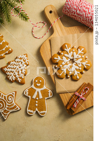 Holiday background. Christmas gingerbread cookies, festive food, home baking. Flat lay 134055021