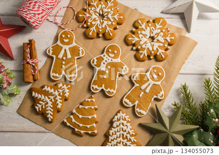 Holiday background. Christmas gingerbread cookies with icing flat lay, festive food 134055073