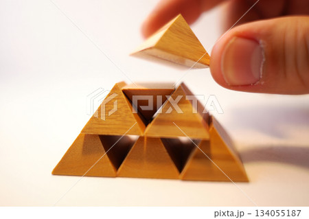 wooden tangram puzzle in play arrow shape 134055187