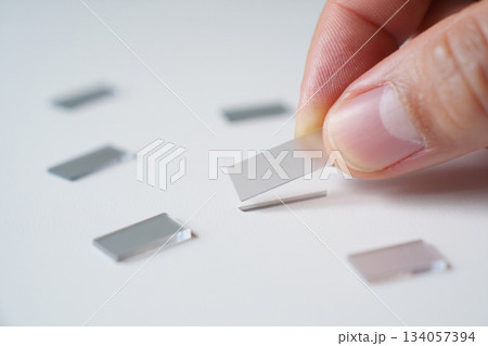 close up of hand with transparent smartphone 134057394