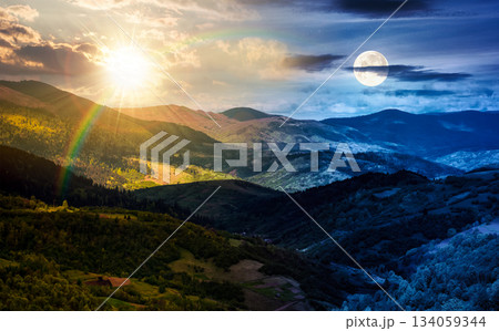 rolling forested hills in spring. day and night time change concept. beautiful scenery of mountainous countryside in dappled light with sun and moon at twilight. equality and shift template 134059344