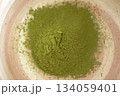 Ceremonial matcha powder in traditional matcha bowl, close-up 134059401