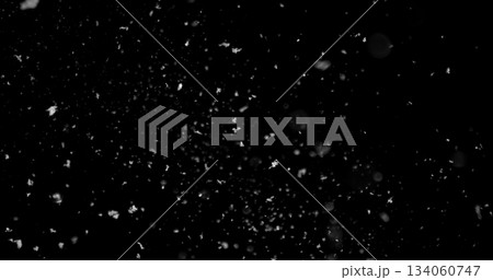 Falling snowflakes isolated on black background. Winter snow overlay texture for VFX, compositing, motion graphics and atmospheric effects Falling snowflakes isolated on black background. Winter snow overlay texture for VFX, compositing, motion graphics and atmospheric effects 134060747