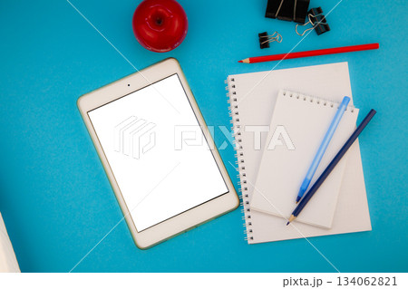 Tablet mockup background top view. Workplace copy space. otepad, notebook and pen. Study and work. Planning. Self-learning. Online course. Education remotely. 134062821
