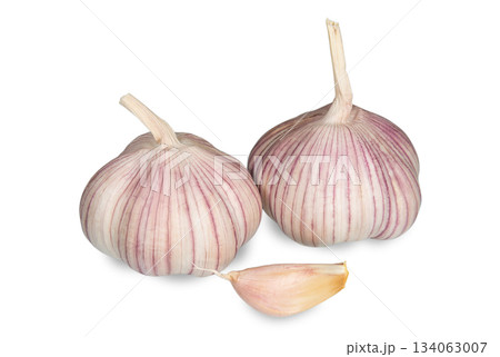 Bulbs and clove of garlic on a white background Bulbs and clove of garlic on a white background 134063007