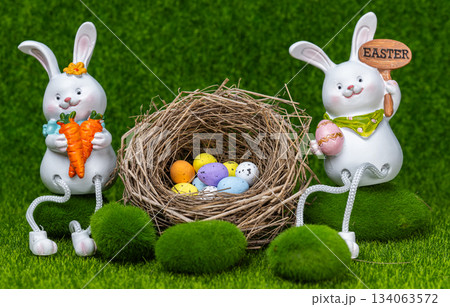 Easter decoration with bunnies and eggs. 134063572