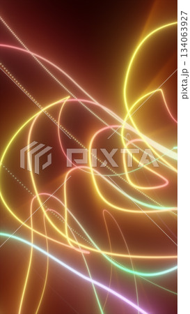 Abstract glowing neon light trails in vibrant colors creating dynamic curved lines on a dark background Abstract glowing neon light trails in vibrant colors creating dynamic curved lines on a dark background 134063927
