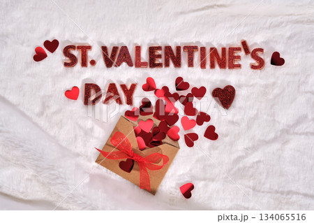 Festive St. Valentine's Day background on a white plush background with hearts. 134065516