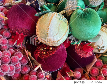 Velvet baubles and frosted berries arranged in festive holiday assortment. Christmas luxury, rich textile decor, winter ornament craft and seasonal celebration atmosphere Velvet baubles and frosted berries arranged in festive holiday assortment. Christmas luxury, rich textile decor, winter ornament craft and seasonal celebration atmosphere 134065678