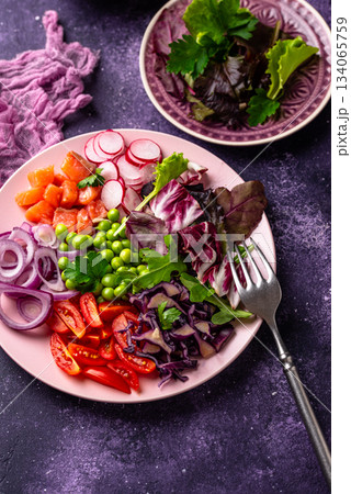Ketogenic bowl with vegetables and salmon 134065759