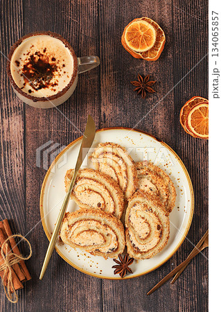 Festive Kitchen Banner. restaurant menus.Homemade winter dessert, stollen, rolls or strudel with sweet cream filling, nuts, cinnamon, cranberries and poppy seeds, and eggnog. Festive Kitchen Banner. restaurant menus.Homemade winter dessert, stollen, rolls or strudel with sweet cream filling, nuts, cinnamon, cranberries and poppy seeds, and eggnog. 134065857
