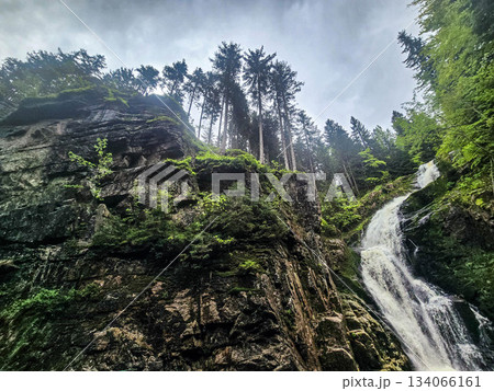 Mountain Symphony The Power and Grace of a Waterfall 134066161