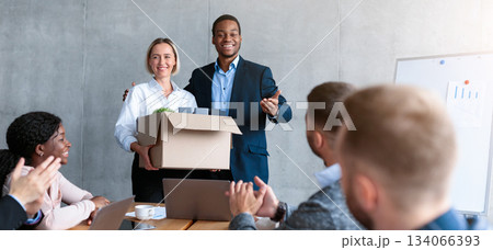 Happy Businessman Introducing New Female Employee To Multicultural Coworkers During Corporate Meeting In Modern Office. Employment And Recruitment, New Job And Business Career Concept Happy Businessman Introducing New Female Employee To Multicultural Coworkers During Corporate Meeting In Modern Office. Employment And Recruitment, New Job And Business Career Concept 134066393
