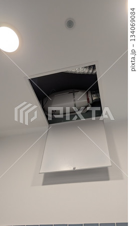 open hatch reveals duct and wiring, urban utility access point with immediate repair indication open hatch reveals duct and wiring, urban utility access point with immediate repair indication 134069084