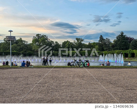 Joyful Moments People by the Fountain Joyful Moments People by the Fountain 134069636