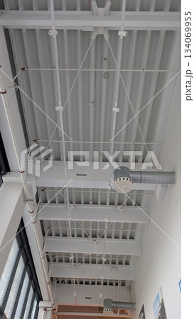 Modern industrial ceilings are vital for a functional, aesthetic space using steel and minimalism 134069955