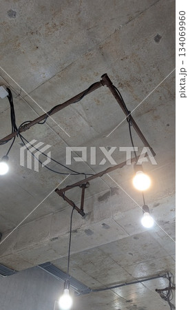 Industrial Ceiling Lighting Featuring Exposed Wiring for Enhanced Aesthetic Appeal and Ambiance Industrial Ceiling Lighting Featuring Exposed Wiring for Enhanced Aesthetic Appeal and Ambiance 134069960