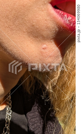 CloseUp Portrait Featuring a Bold Lip Color Along with Fashion Accessories to Enhance Style CloseUp Portrait Featuring a Bold Lip Color Along with Fashion Accessories to Enhance Style 134069980