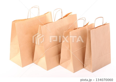 Shopping brown gift bags isolated Shopping brown gift bags isolated 134070060