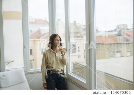 Casual writer appreciating daylight during peaceful break 134070300