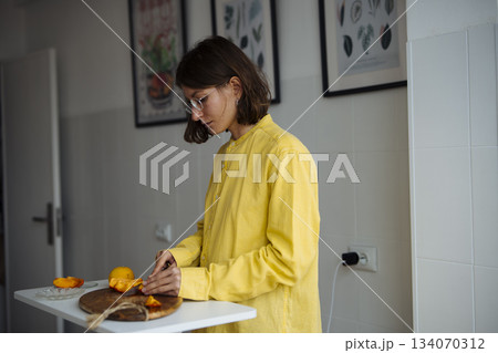 white woman food blogger preparing breakfast in kitchen white woman food blogger preparing breakfast in kitchen 134070312