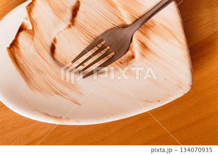 Closeup of dirty saucer plate. Closeup of dirty saucer plate. 134070935