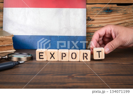 Dutch Flag Background With Wooden Blocks Spelling Export on Wooden Table Dutch Flag Background With Wooden Blocks Spelling Export on Wooden Table 134071199
