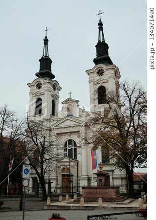 The twin towers of Saint Nicholas Cathedral rise above the central square of Sremski Karlovci, Serbia. The architecture reflects deep cultural and spiritual traditions 134071490