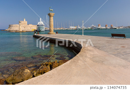 Fort Saint Nicholas at Mandraki harbor in Rhodes, Greece 134074735
