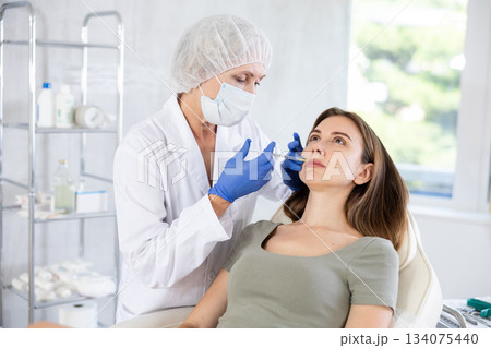Facial injection young patient Facial injection young patient 134075440