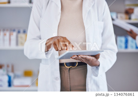 Doctor, woman and hands on tablet for medical research, Telehealth or inventory at pharmacy. Hand of female healthcare professional in data analysis or health insurance holding technology at clinic Doctor, woman and hands on tablet for medical research, Telehealth or inventory at pharmacy. Hand of female healthcare professional in data analysis or health insurance holding technology at clinic 134076861