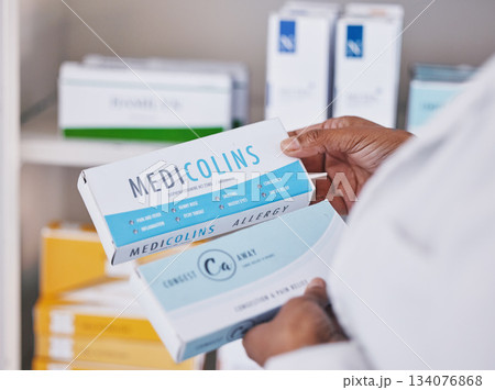 Doctor, hands and pharmacy medication for healthcare prescription, diagnosis or cure for illness or pain. Hand of medical professional or pharmacist with medicine, pills or drugs for health insurance Doctor, hands and pharmacy medication for healthcare prescription, diagnosis or cure for illness or pain. Hand of medical professional or pharmacist with medicine, pills or drugs for health insurance 134076868