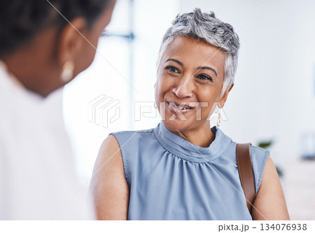 Happy, healthcare and a woman customer in a pharmacy for medicine, talking to a professional consultant. Smile, medical and a mature female patient chatting to a pharmacist in a clinic or dispensary 134076938