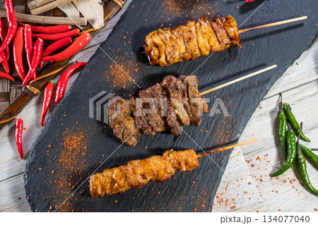grilled pork shish kebab on skewers 134077040