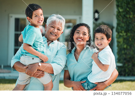 Mother, grandma and children portrait outdoor as family in backyard of house with a smile, love and care. Woman, senior and boy kids together security, support and quality time with happiness Mother, grandma and children portrait outdoor as family in backyard of house with a smile, love and care. Woman, senior and boy kids together security, support and quality time with happiness 134077056