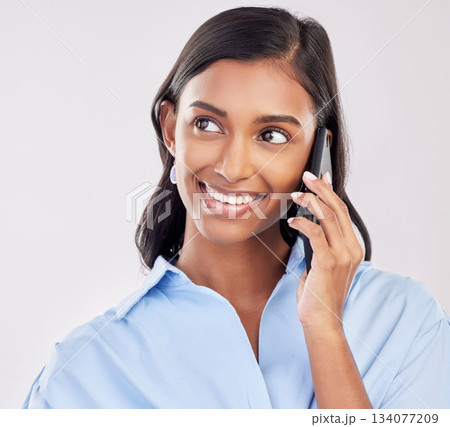 Business woman, phone call with smile and communication, deal and networking with contact on studio background. Happy, Indian female, conversation on company cellphone with technology and connection 134077209
